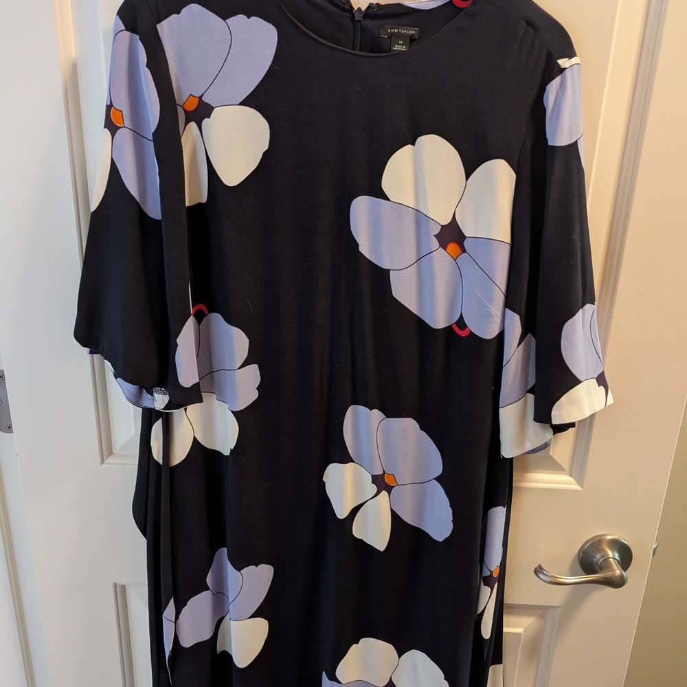 Chic Black Dress with Bold Floral Design